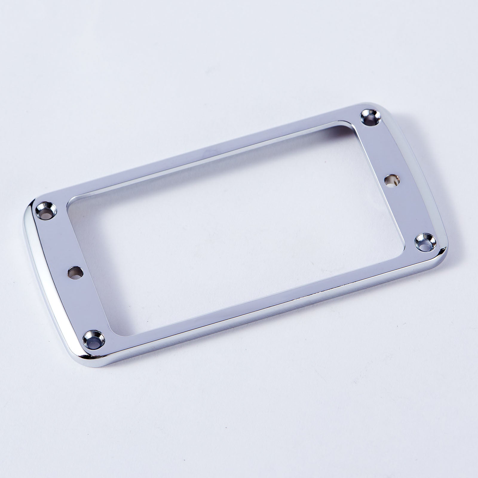 A durable and versatile pickup frame designed to accommodate different electric guitar models.