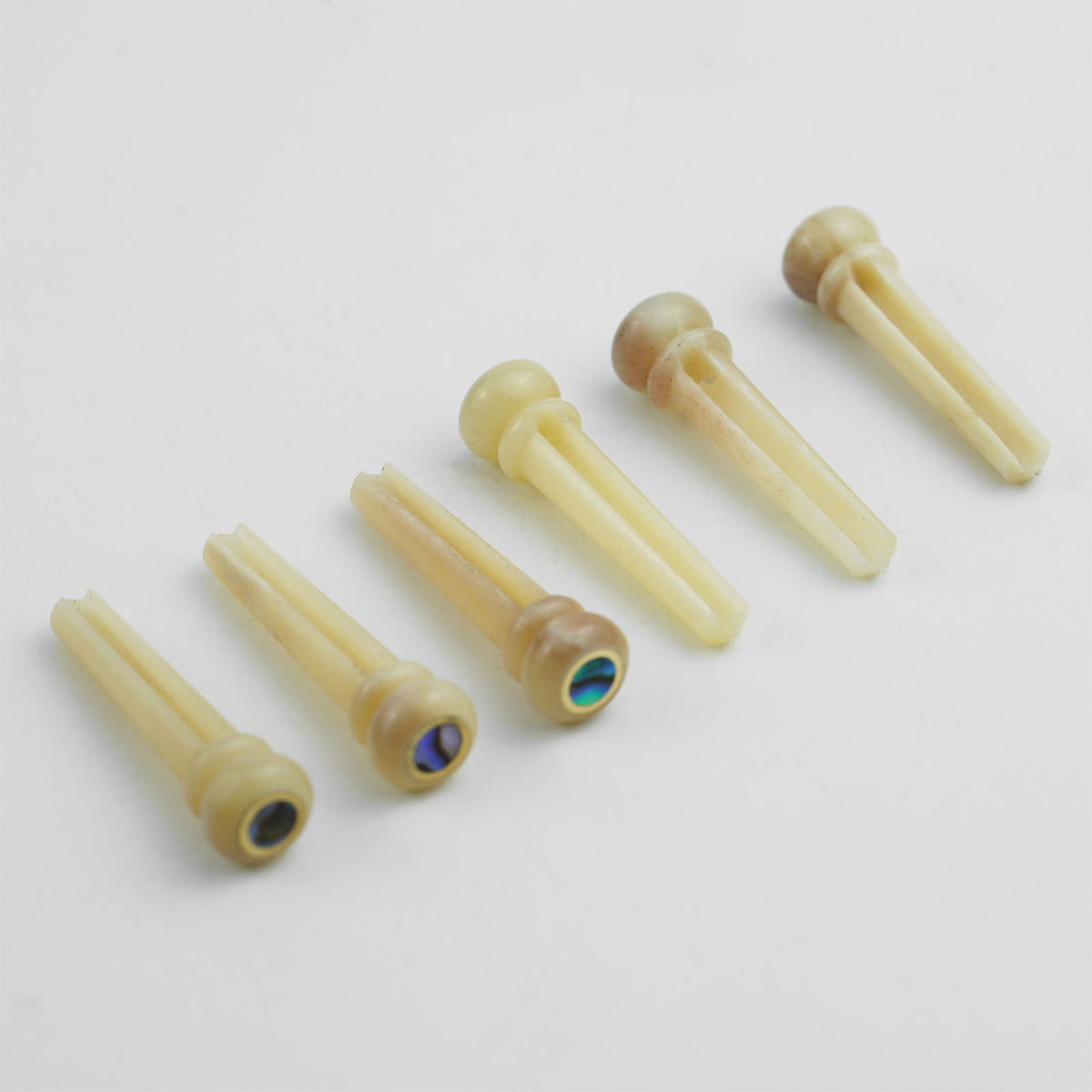 Guyker GX016 Camel Bone Acoustic Guitar Bridge Pins with Abalone Inlays