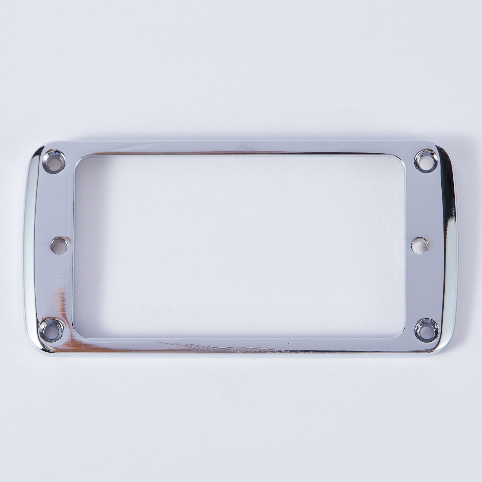 A durable and versatile pickup frame designed to accommodate different electric guitar models.