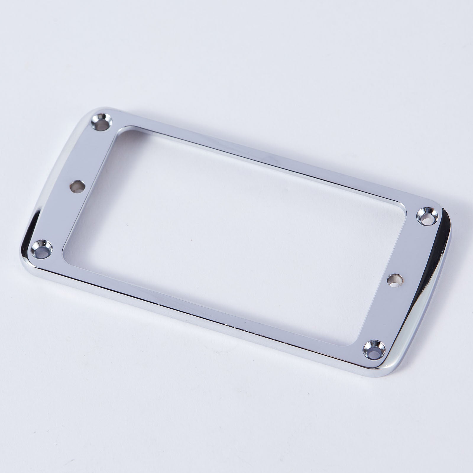 A durable and versatile pickup frame designed to accommodate different electric guitar models.